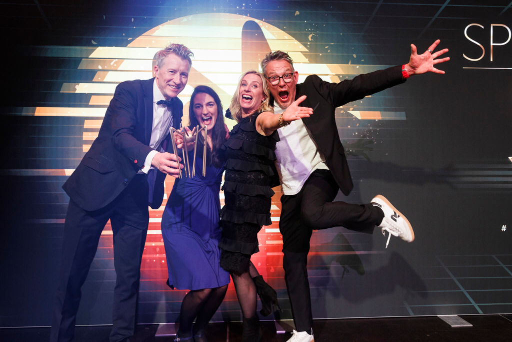 hello humans staff receiving small agency of the year award